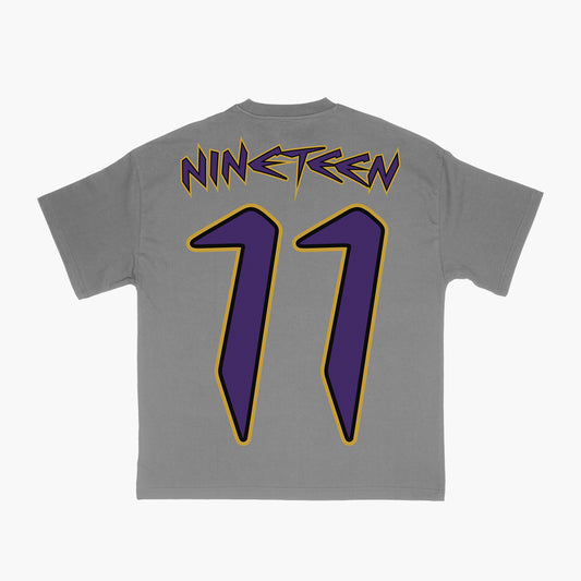 Que Strike Jersey Tee. (cement)
